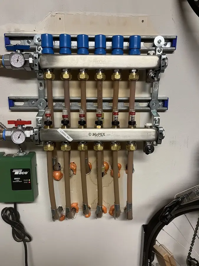 Plumber performing Leak Detection at a residential property in Quincy